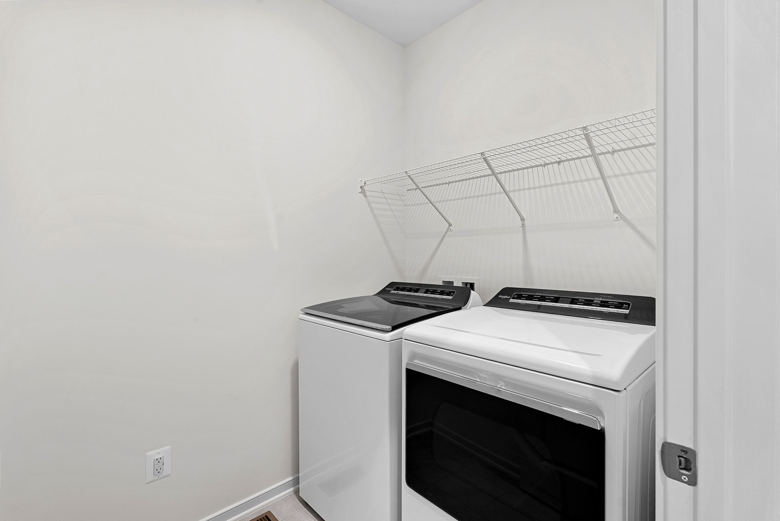 laundry with washer and dryers