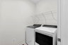 laundry with washer and dryers
