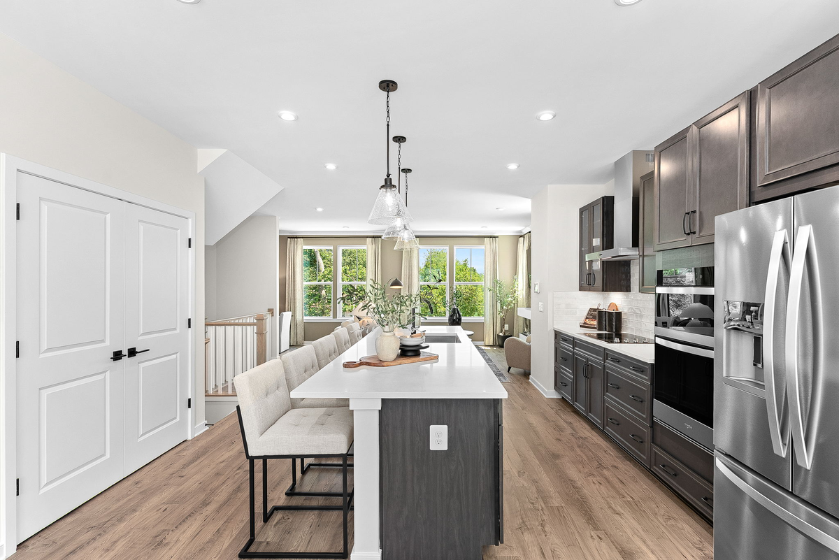 kitchen with center island adjacent to great room