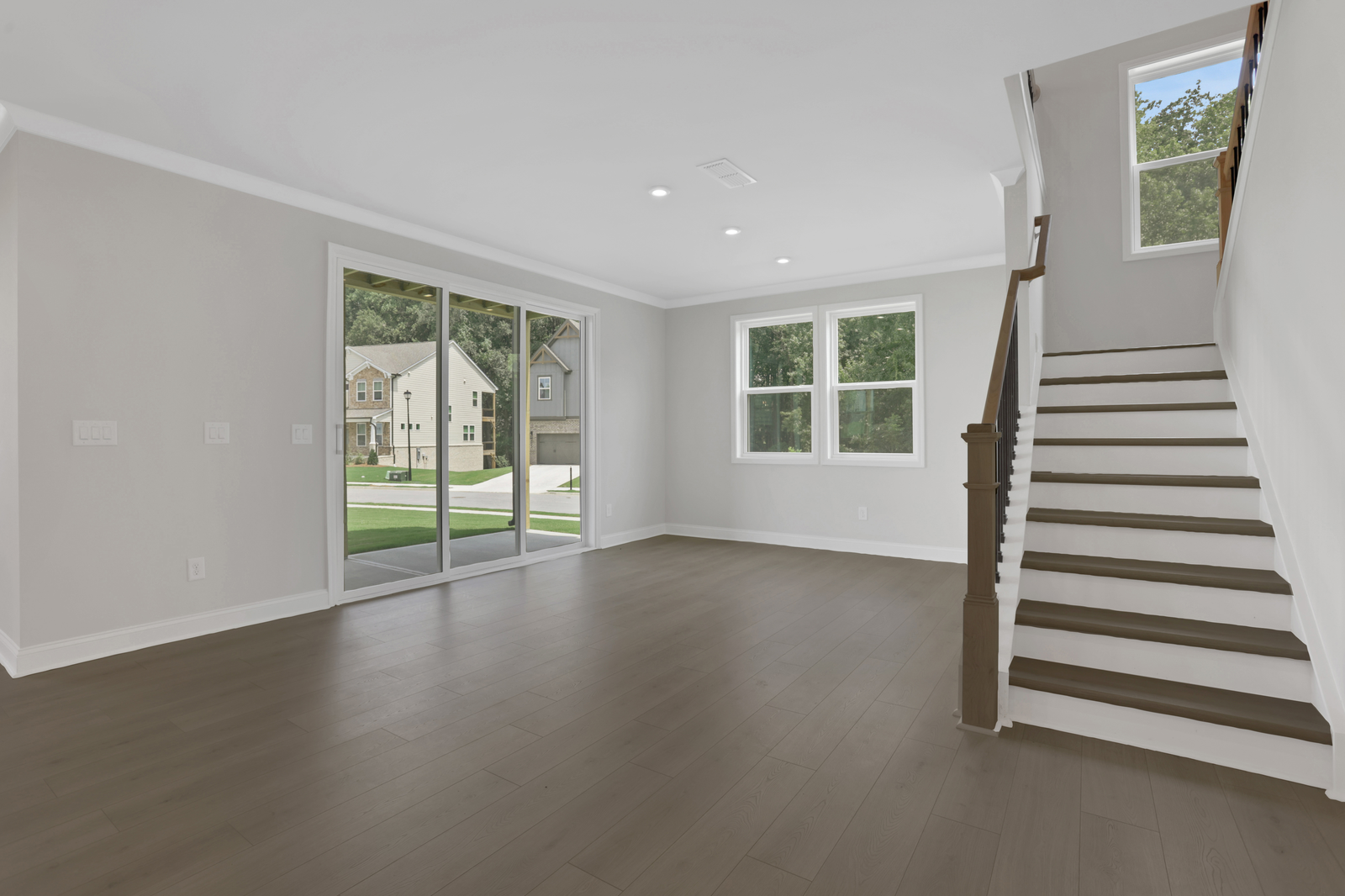 dining room with hard surface flooring and windows