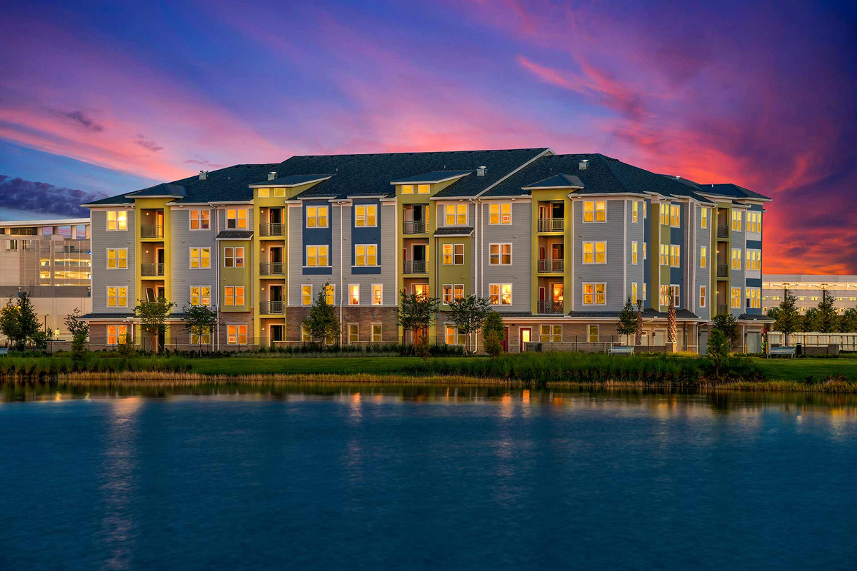 twilight building exterior over lake