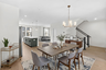 dining room with dining table and overhead lighting