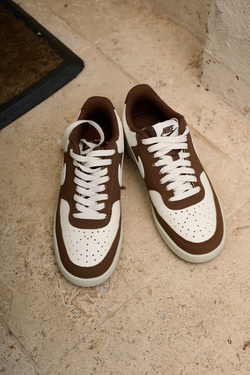 Brown & white Nike sneakers