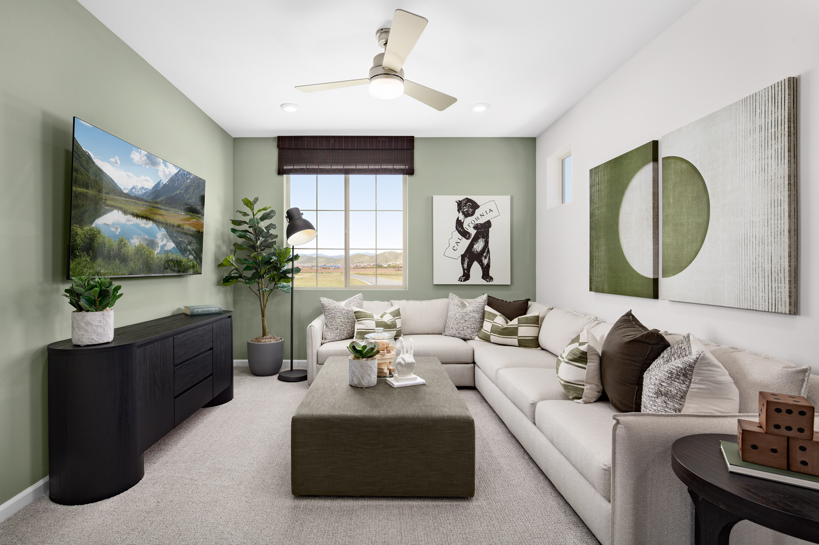 loft featuring a white sectional and a brown coffee table with plants