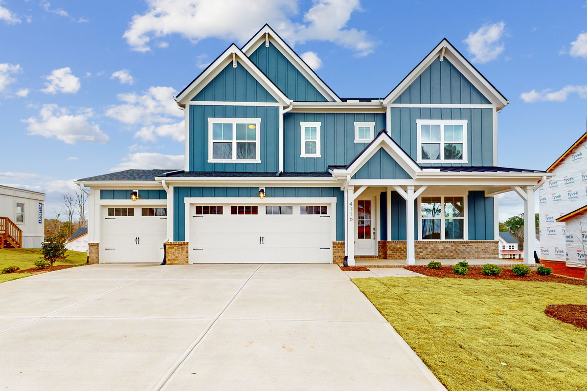 two-story home with covered porch