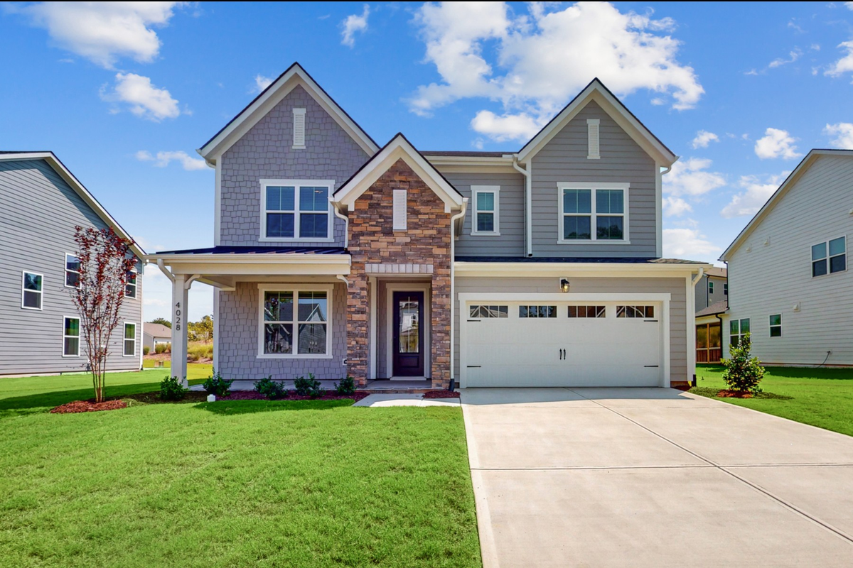 two-story single-family home with stone entry