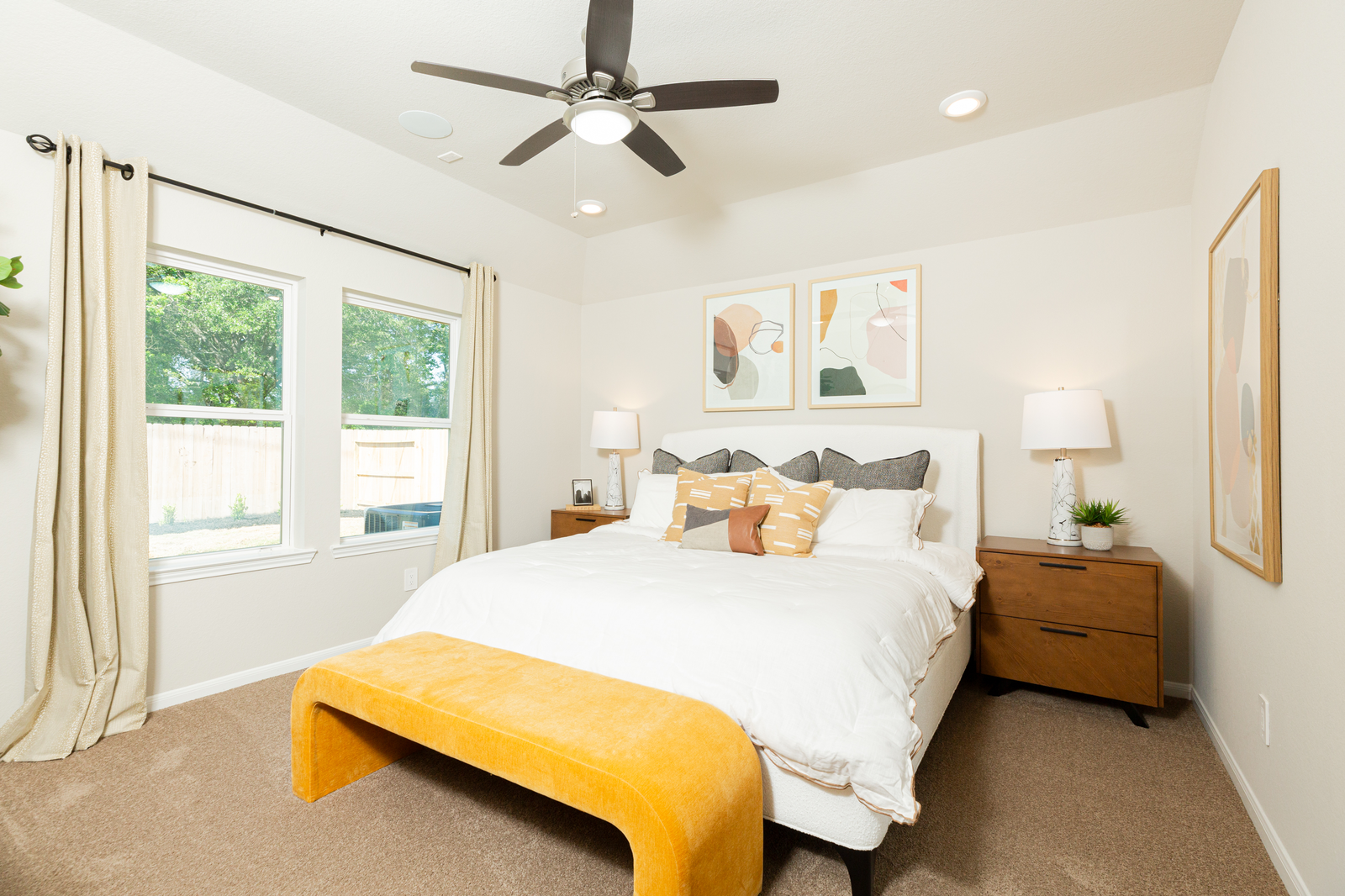 bedroom with carpet & ceiling fan