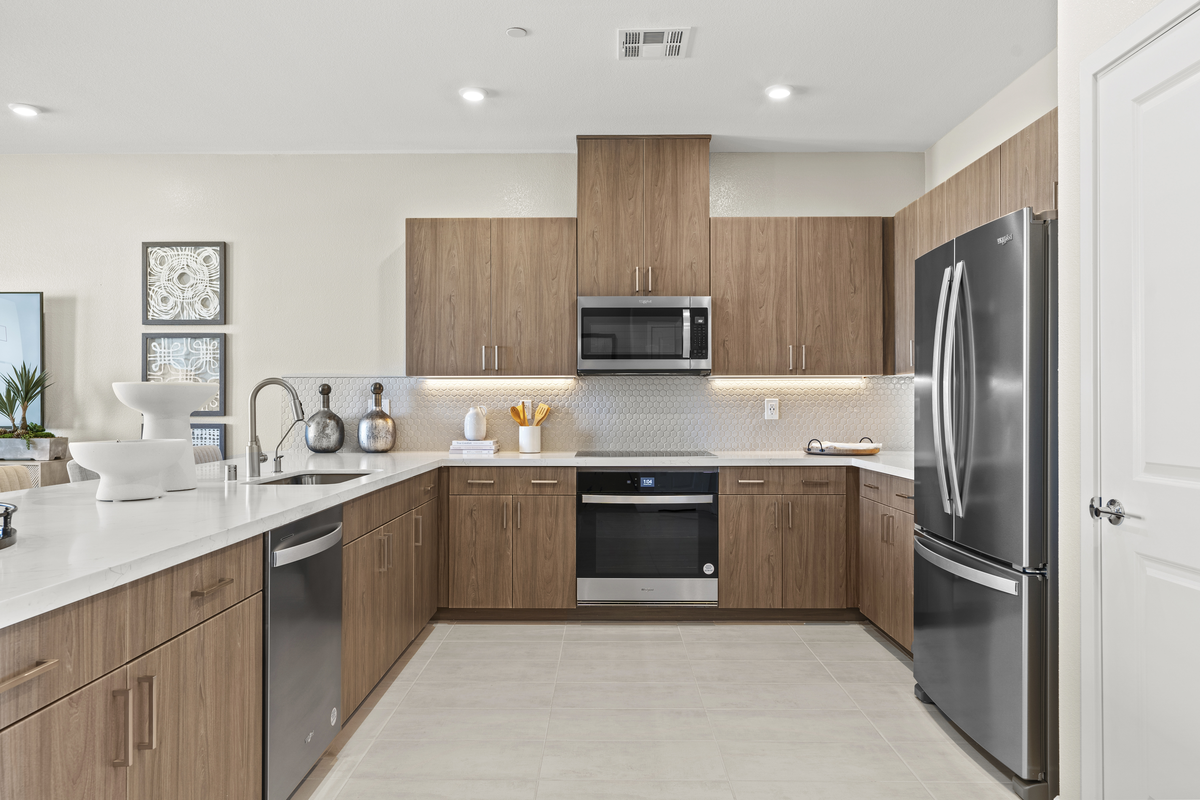 kitchen with brown cabinets and white countertops
