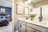 secondary bath with dual vanity and quartz counters