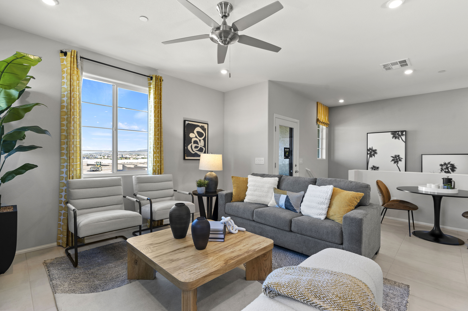 living room with couch and large window