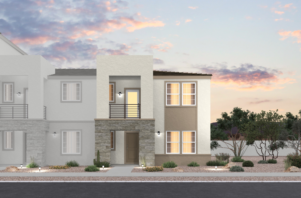 desert landscaping and townhome with balcony