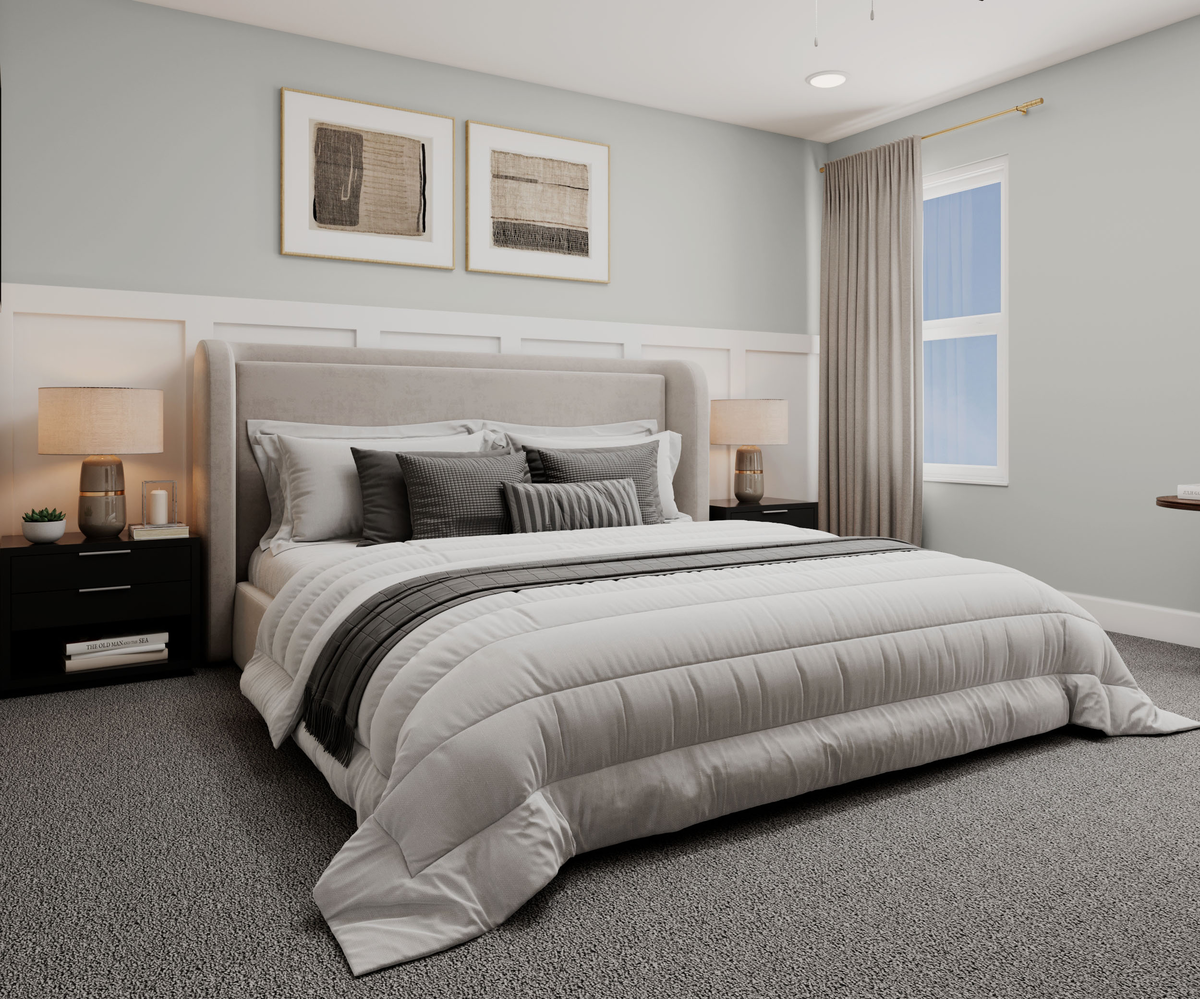 kig bed with accent wall and carpet floors