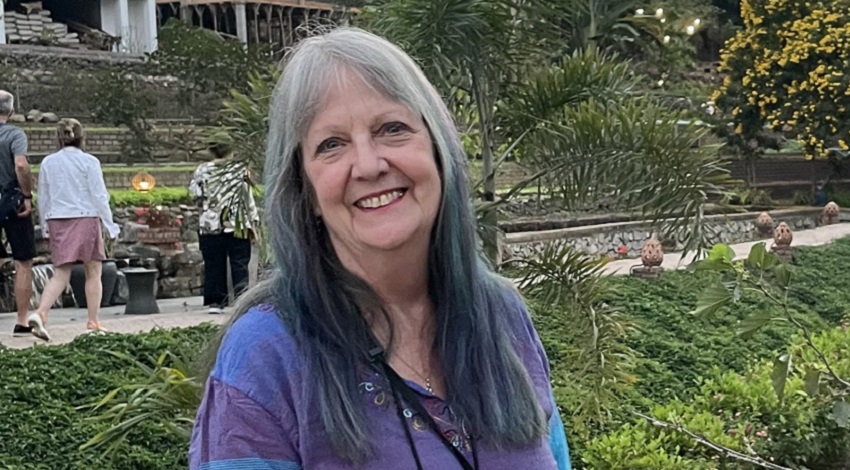 Molly smiling for a photo on her trip to Southeast Asia