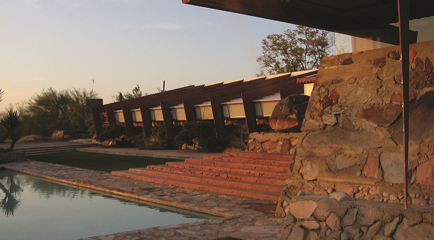 A view of Frank Lloyd Wright's Taliesin West house at sunset