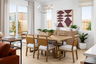dining room with wood table & seating for six, wood floors, and brushed nickel modern hanging light fixture