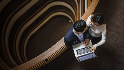 Business people meeting on stairs