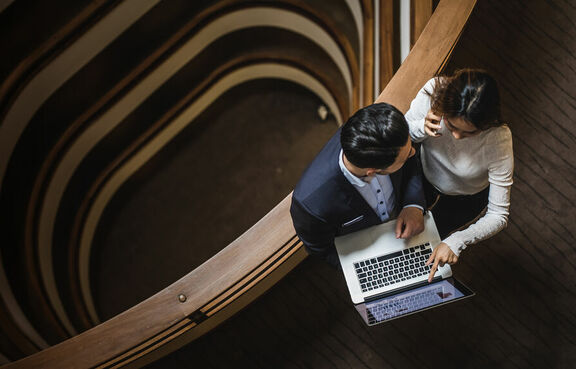Business people meeting on stairs