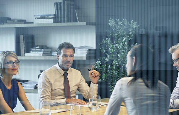 Professional team analyzing financial documents