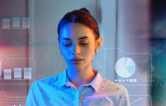 Woman using a tablet looking graphs and charts