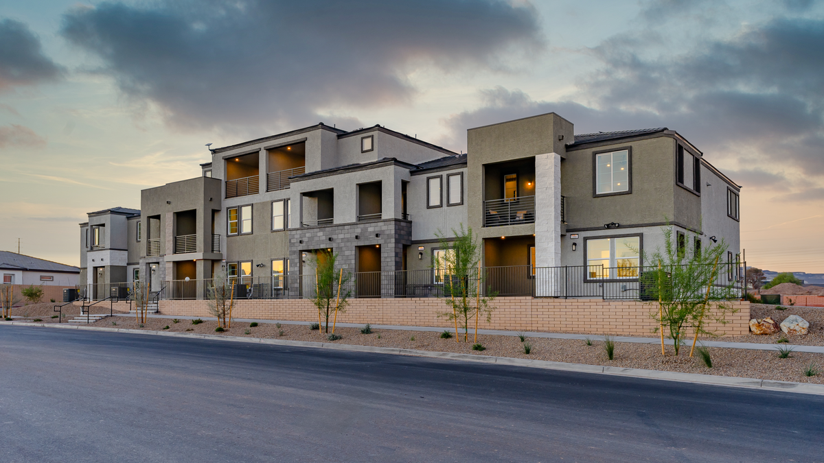 townhome building with desert landscaping 