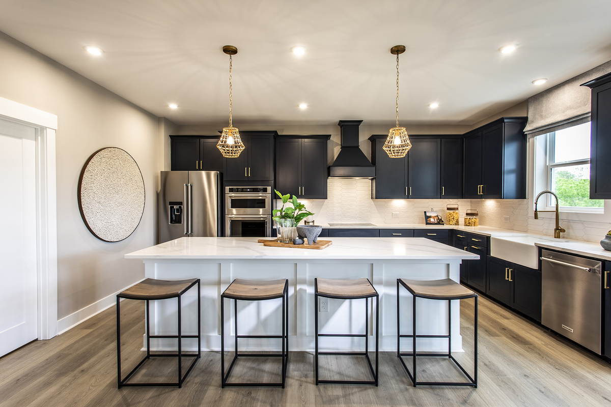 kitchen with expansive island & quartz counters