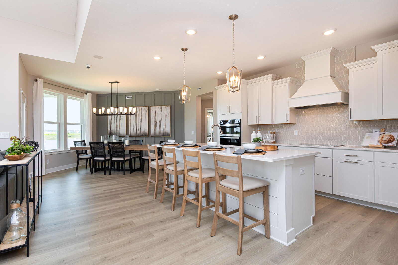 open-concept kitchen with wood plank flooring