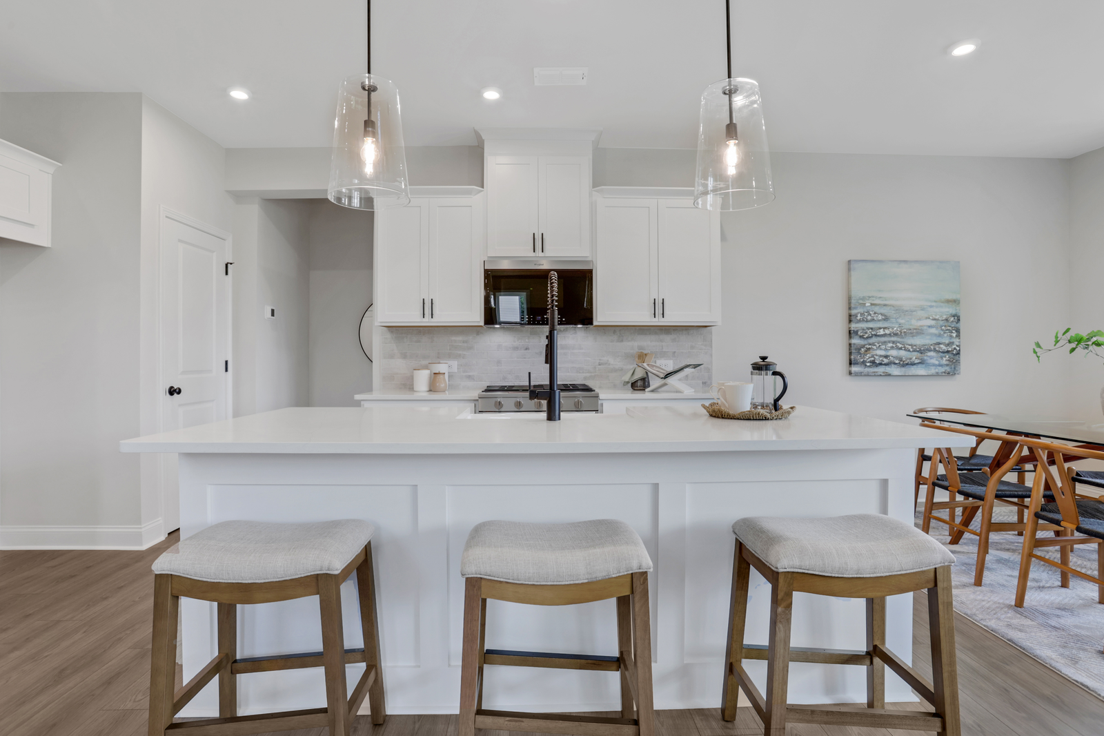 kitchen with white cabinets and quartz counters