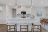 kitchen with white cabinets and quartz counters