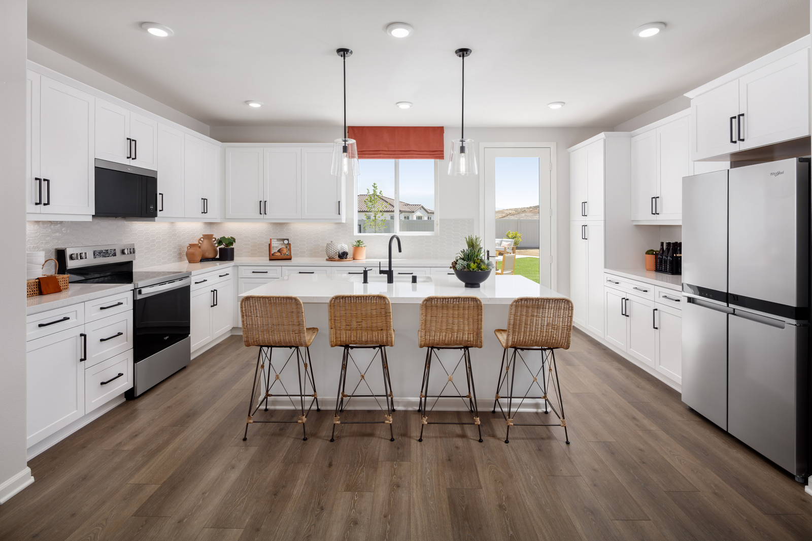 kitchen with large windows and large island