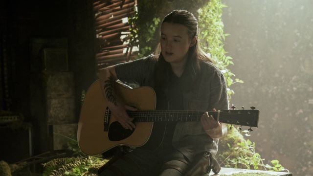 Ellie playing the guitar in seattle music shop.jpg