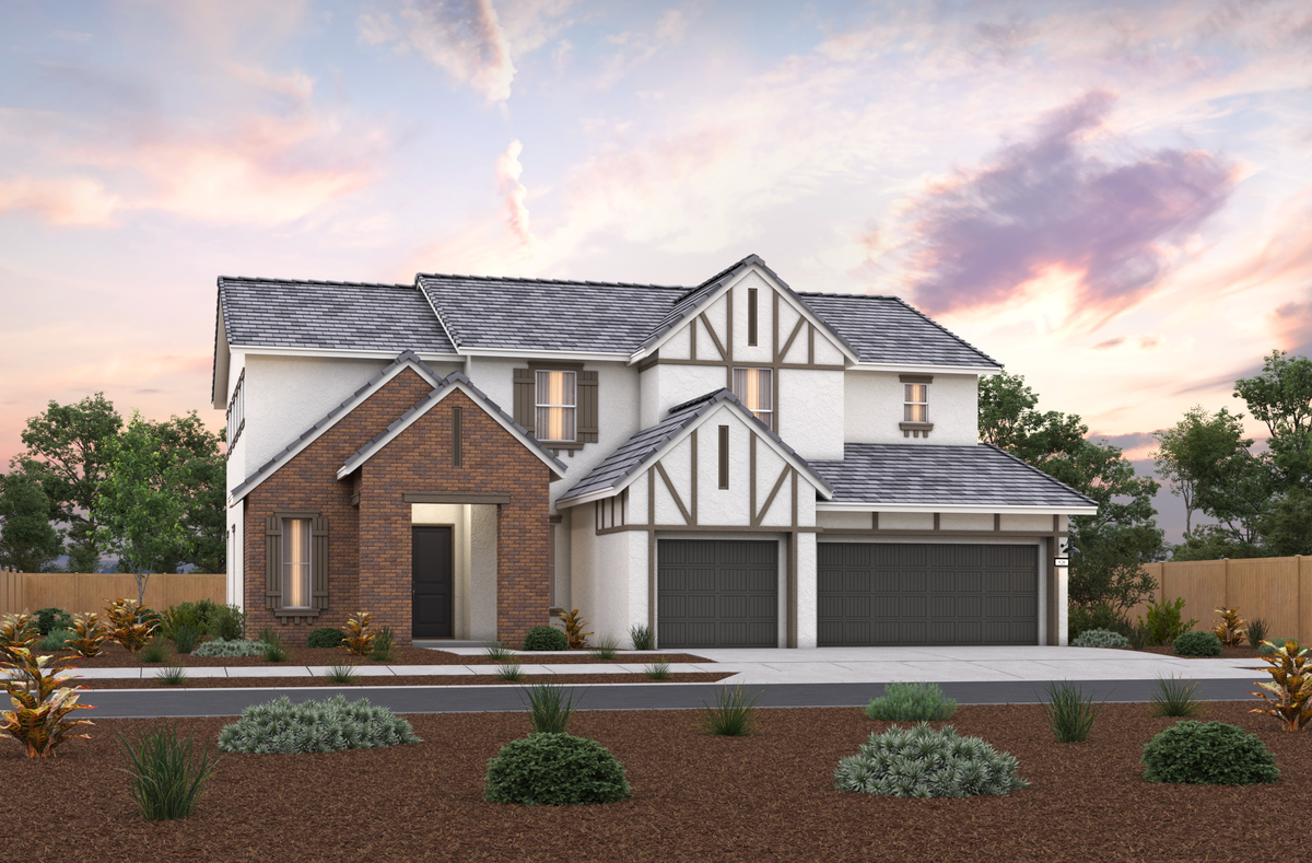 two-story home with brick & white exterior