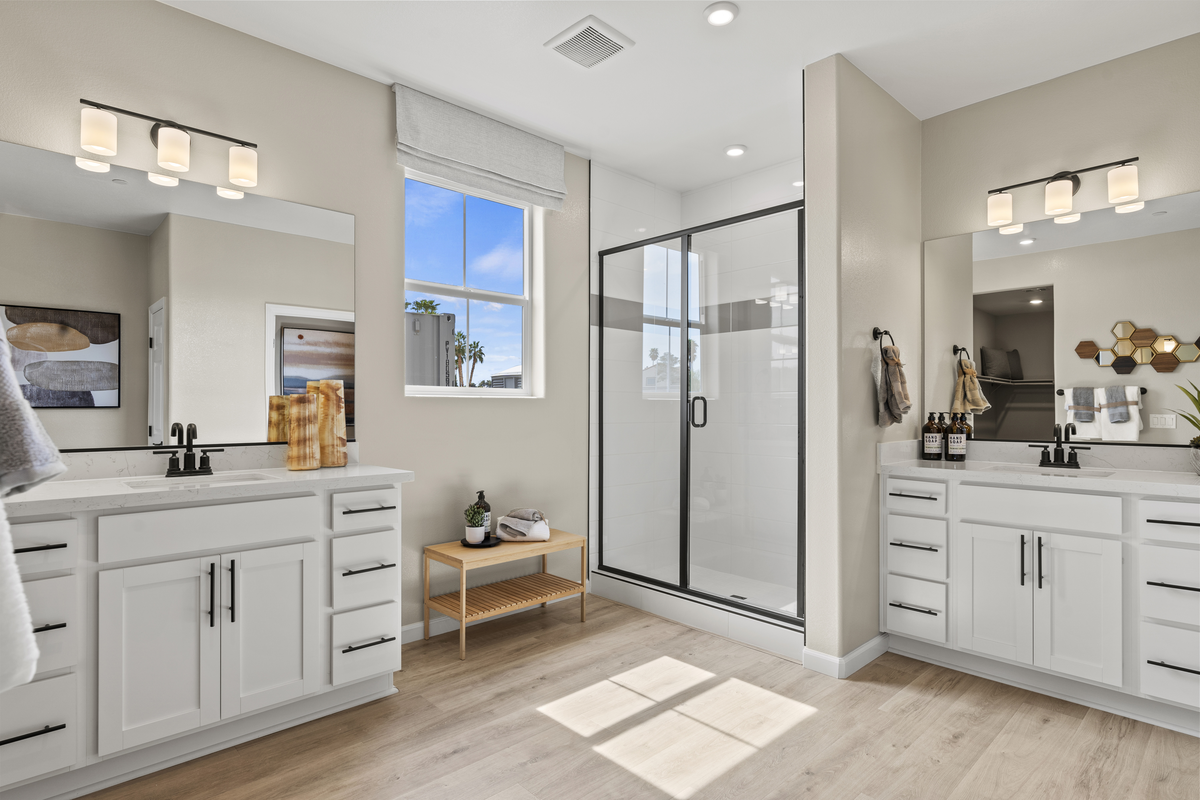 bright primary bathroom with walk-in shower