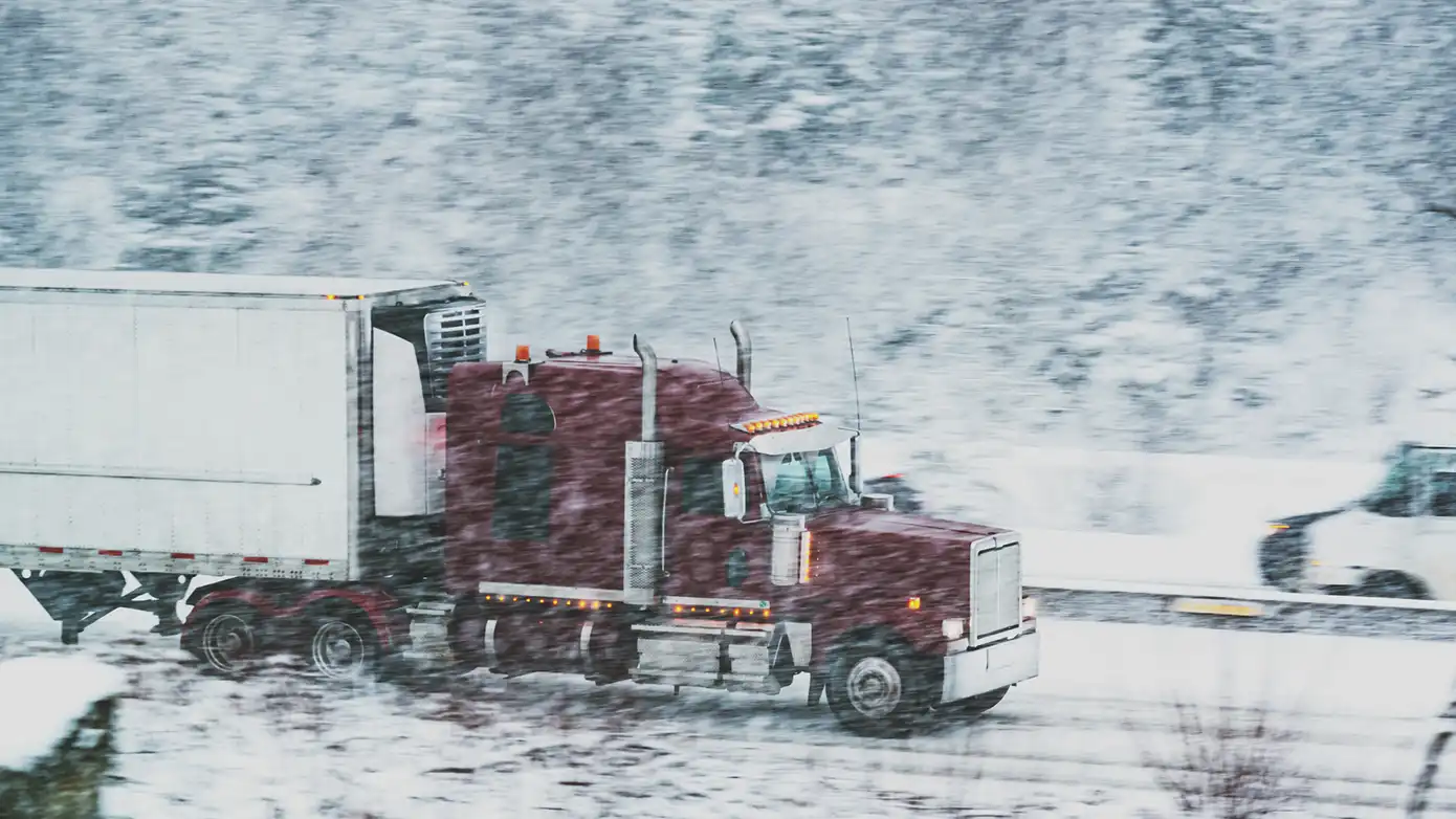 Expand-B2B-Fulfillment-Operational-Excellence-In-Page-3.webp Image of a truck driving through the snow.