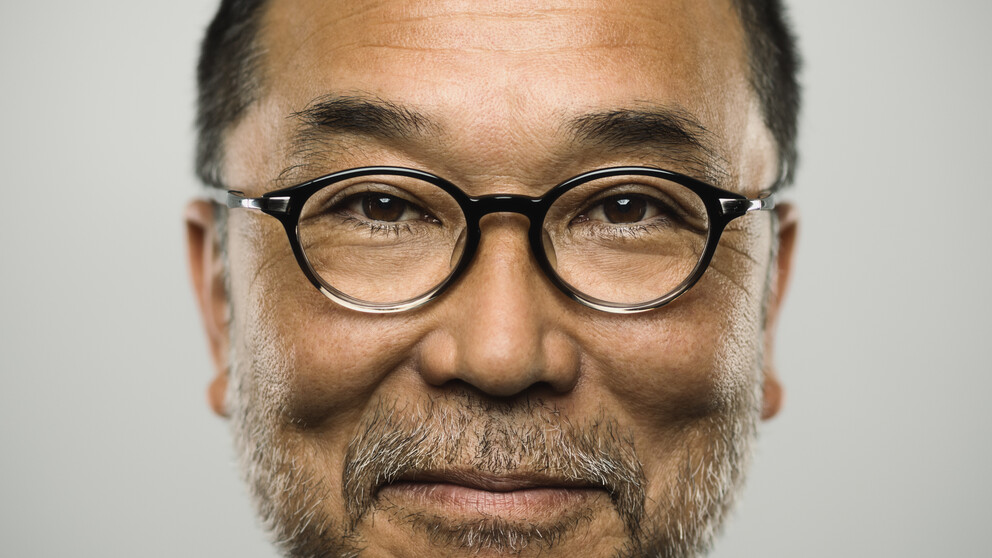 Older Asian man with glasses