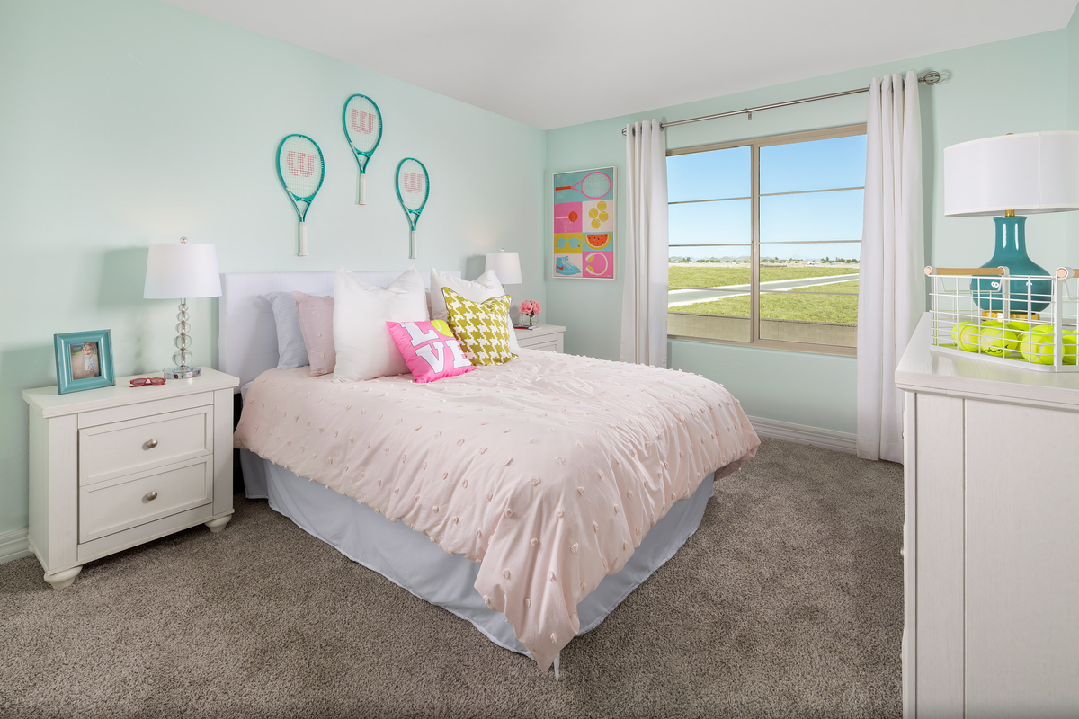 guest bedroom with children's art