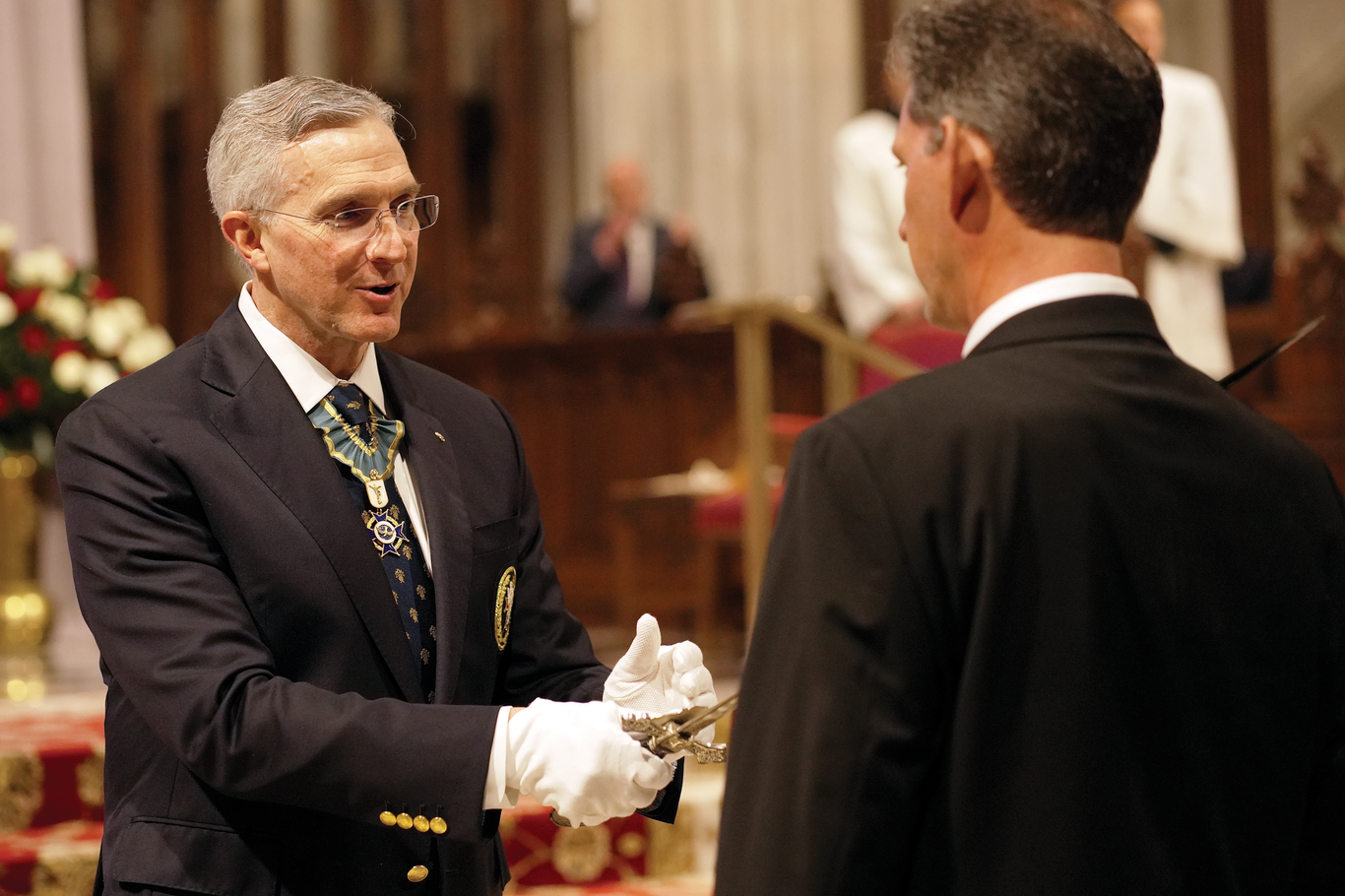 Supreme Knight Patrick Kelly dubs a new Fourth Degree Knight during the knighting ceremony concluding the Exemplification of Patriotism.