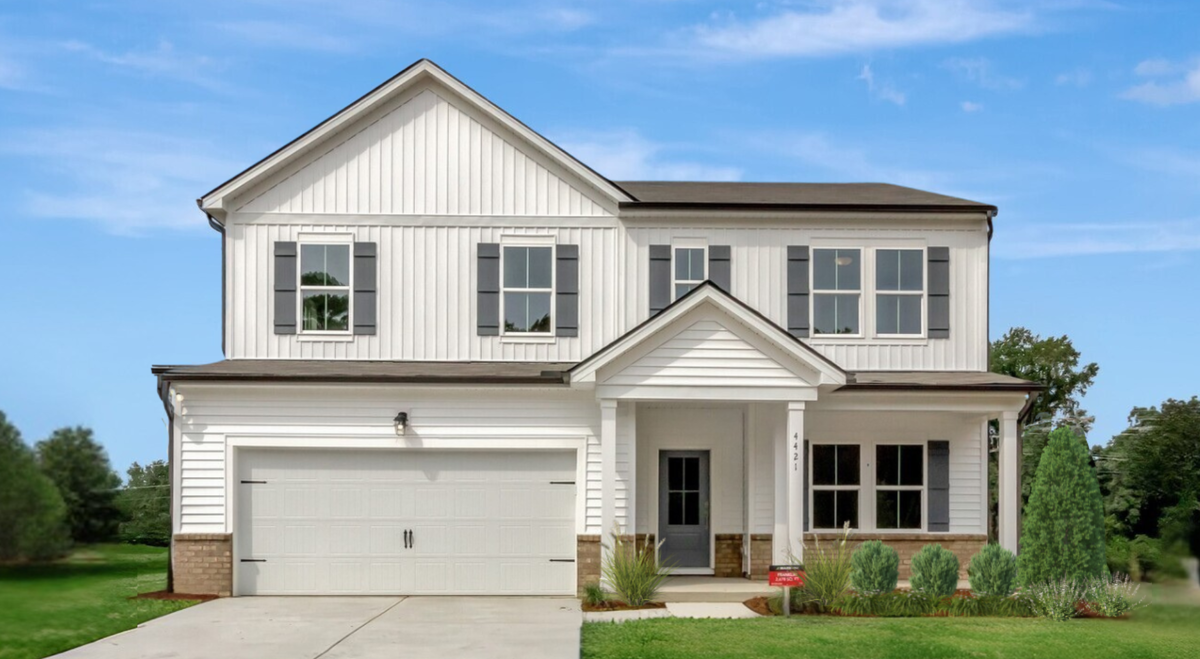 two-story single-family home with covered porch