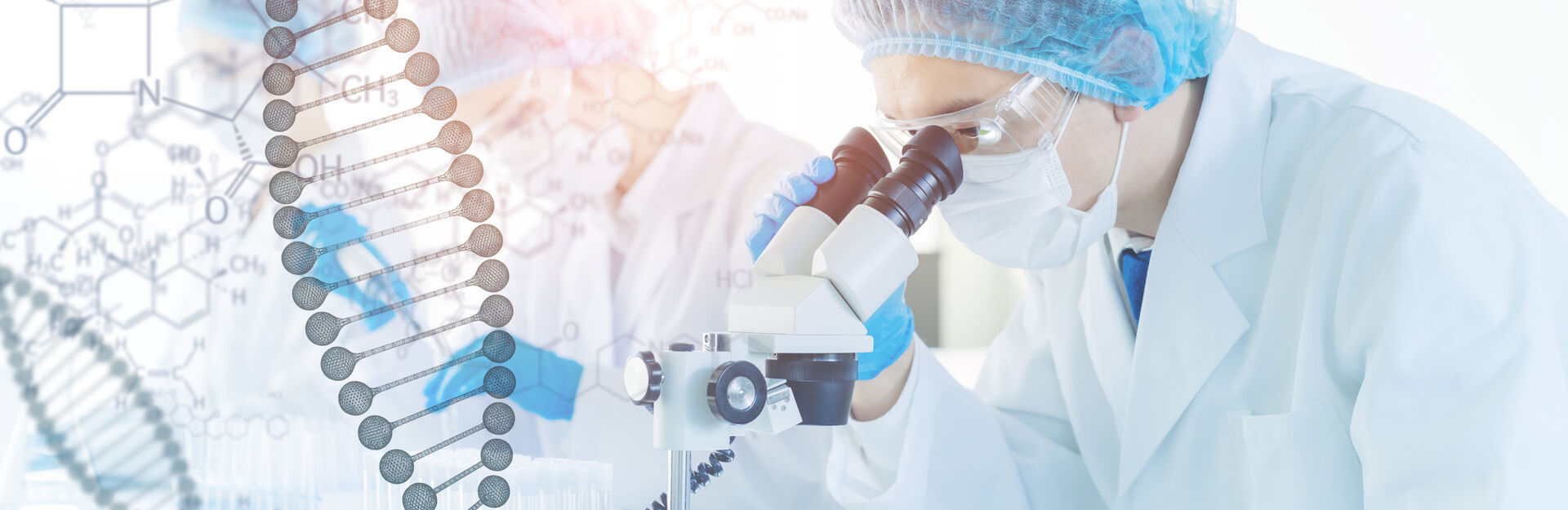 man in lab looking at microscope with DNA double helix and chemistry graphics over it