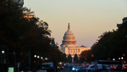 Washington D.C. Capitol Building at dusk with traffic lights