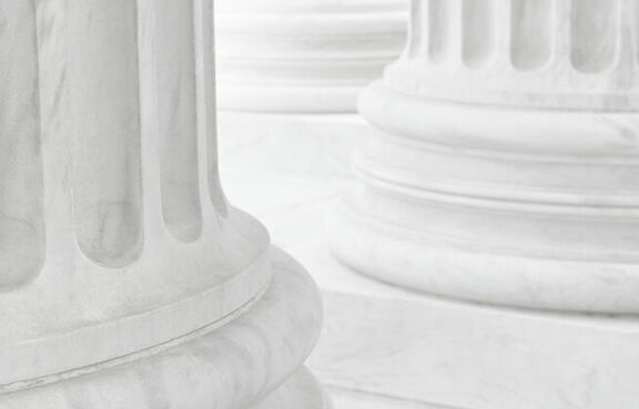 Close up of white marble columns of a government building