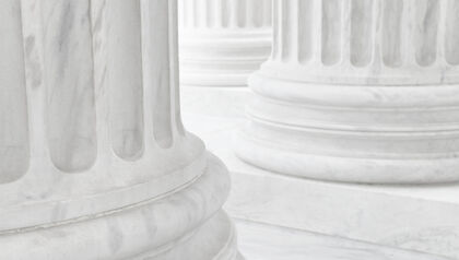 Close up of white marble columns of a government building