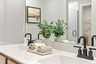 primary bathroom with dual sink vanity