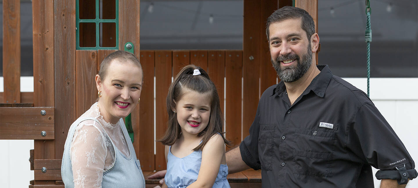 Heather Curley enjoys some family time with her daughter, Palmer, and husband, Dennis. When Heather was diagnosed with leptomeningeal disease, her prognosis was only two to four months.