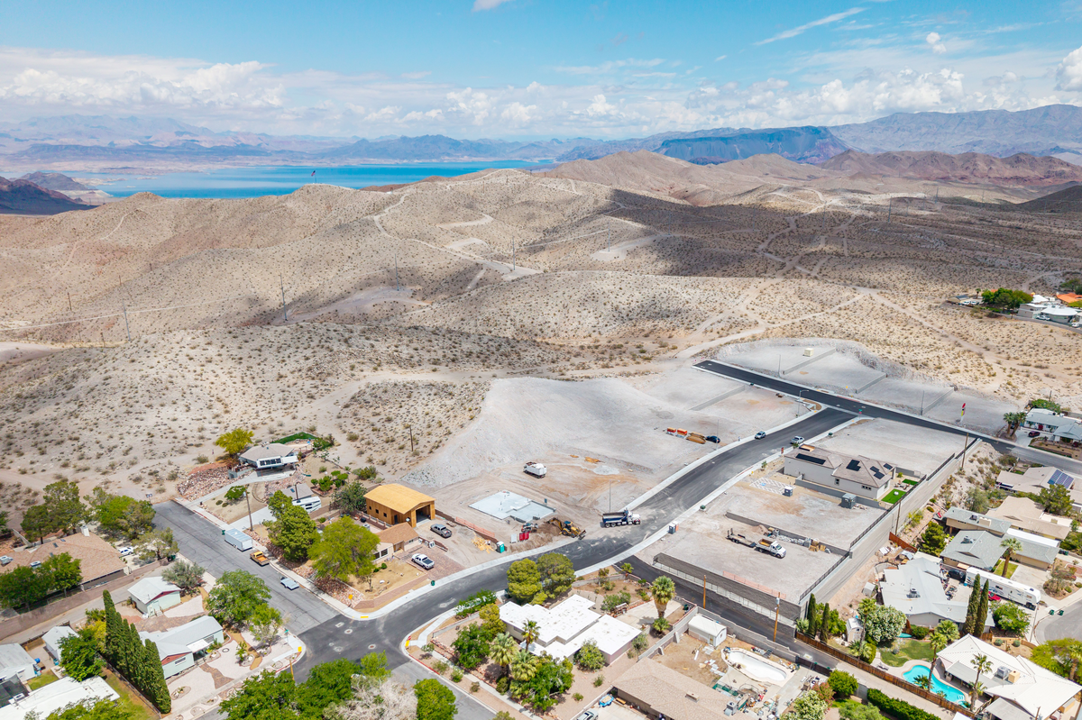 community with surrounding mountains and lake view