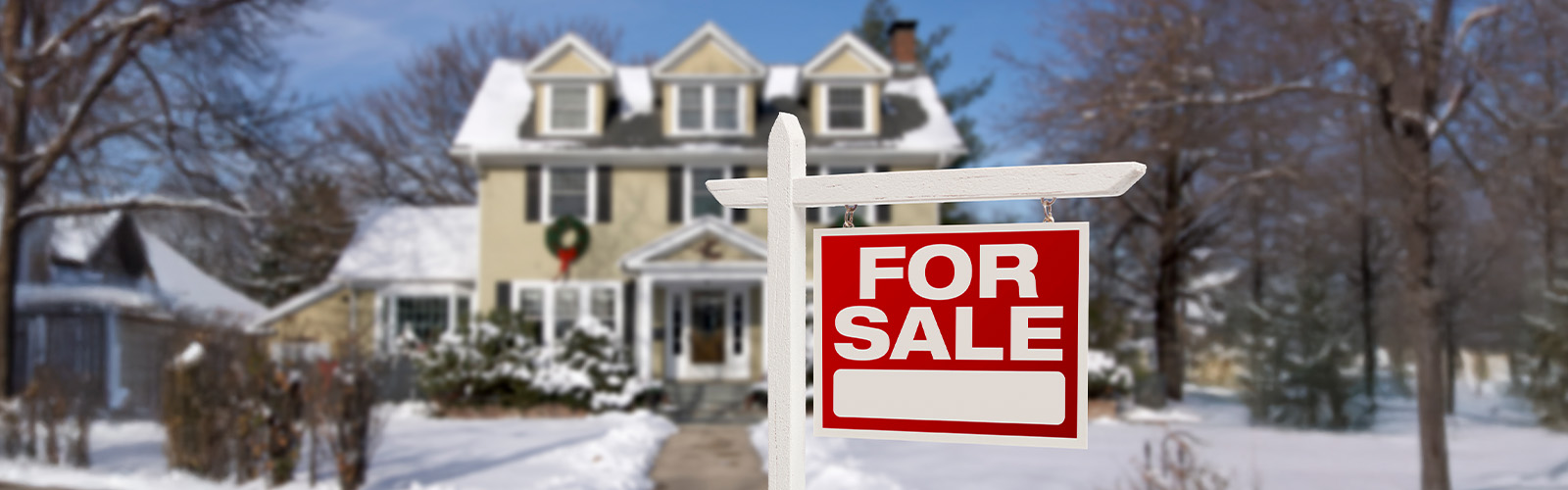 A home for sale in the snow