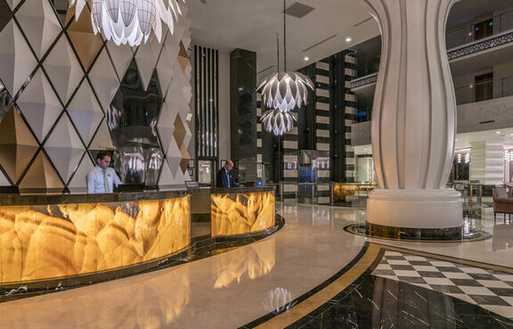Ornate reception desk in the lobby of a hotel