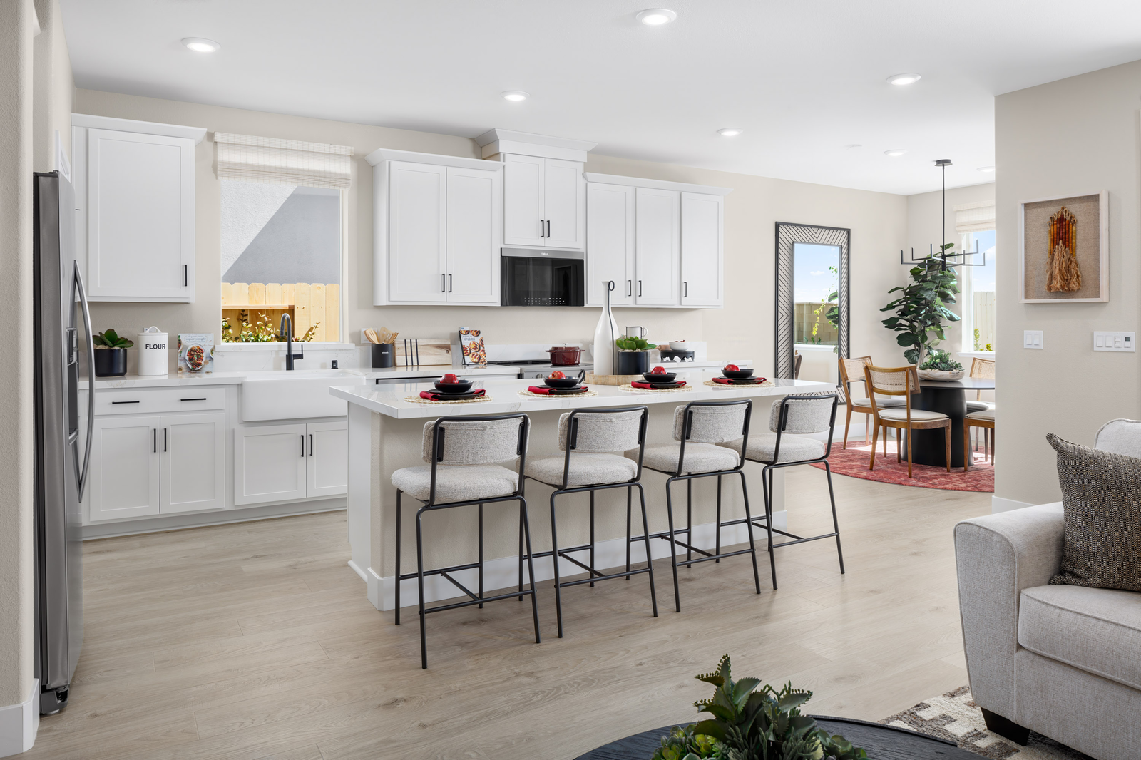 kitchen with white cabinets and wood floors