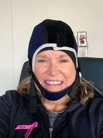 Karen Mills wears the DigniCap during treatment.