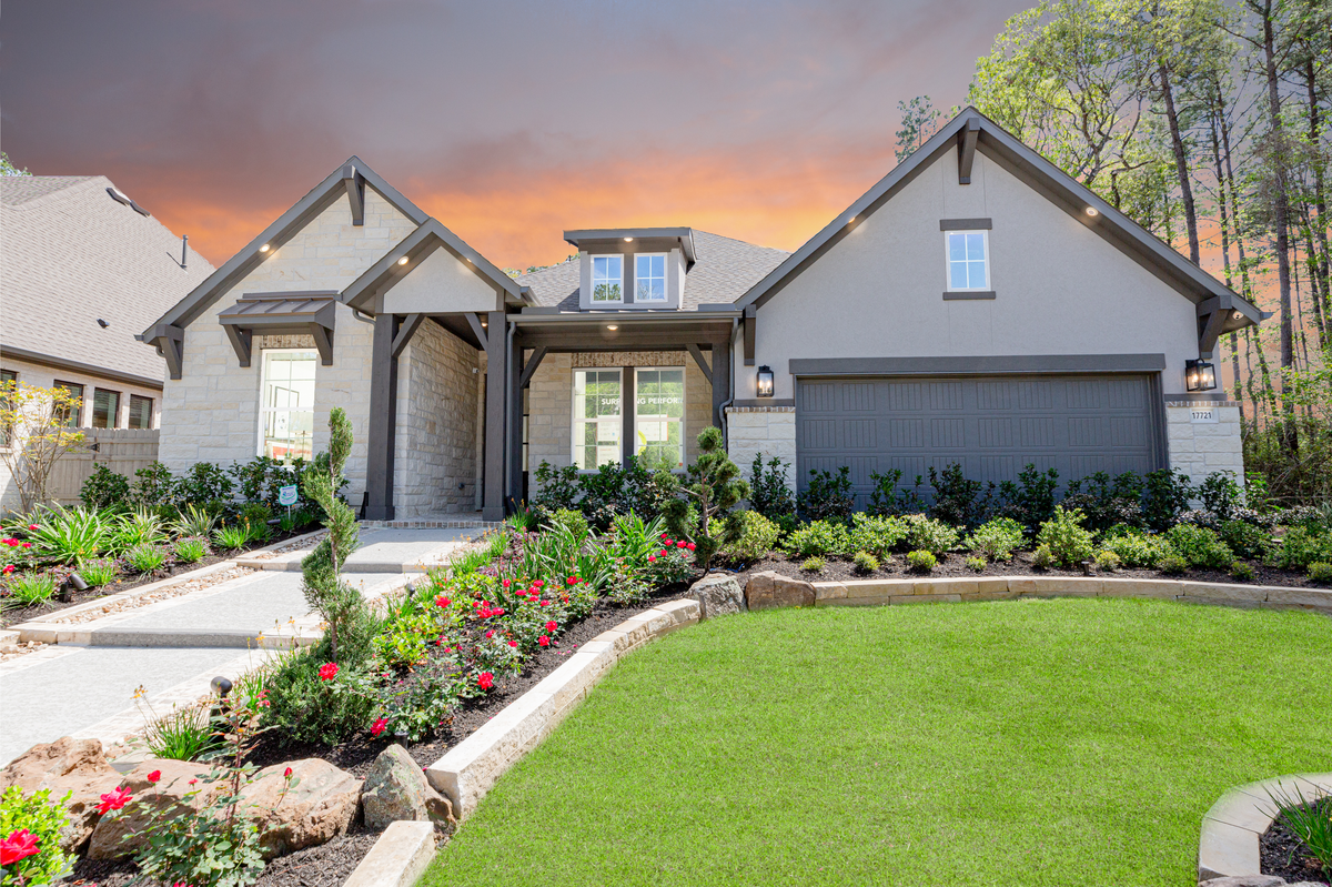 home front elevation with stone and stucco