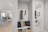 valet bench with hooks for storage by laundryroom